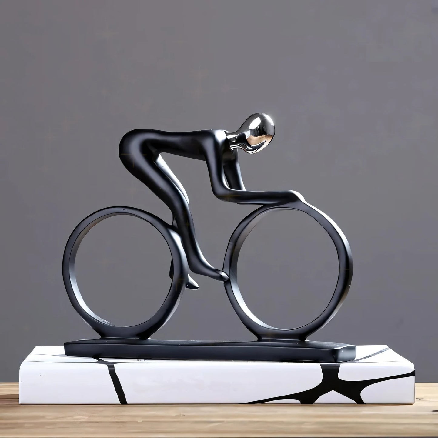 Cyclist In Motion Sculpture